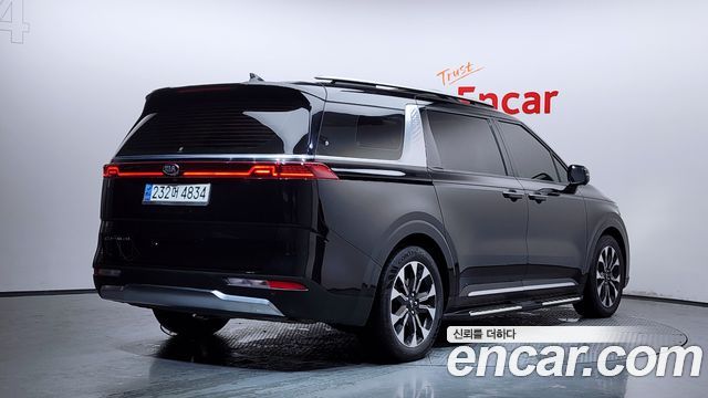 Kia Canival 2021 — photo 2