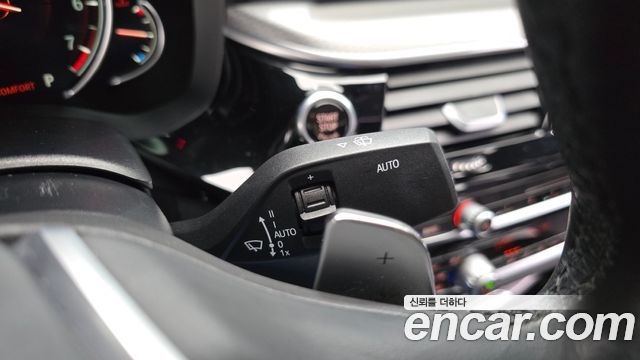 BMW 5-Series 2018 — photo 26