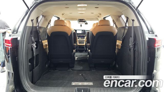 Kia Canival 2023 — photo 26