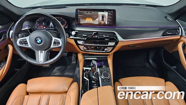 BMW 5-Series 2022 — photo 10