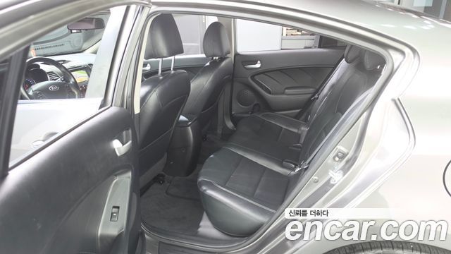 Kia K3 2013 — photo 11
