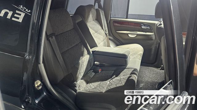 KG Mobility Musso 2002 — photo 17