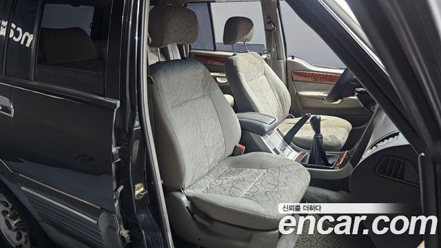 KG Mobility Musso 2002 — photo 18