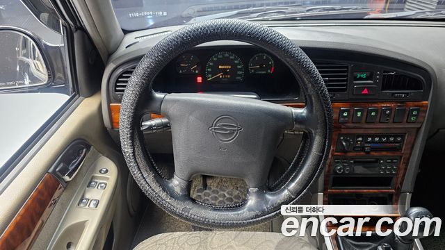 KG Mobility Musso 2002 — photo 19
