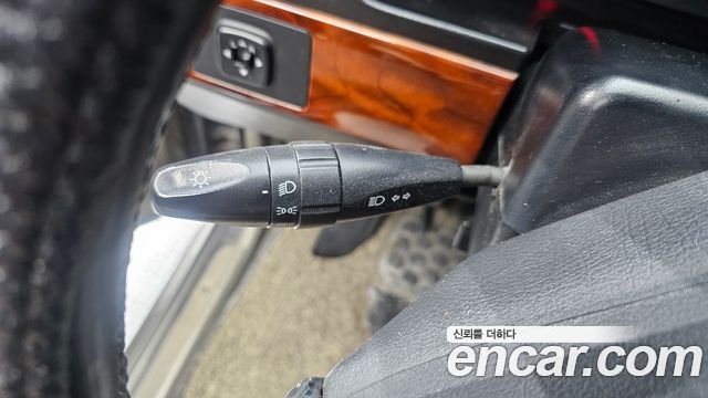 KG Mobility Musso 2002 — photo 22