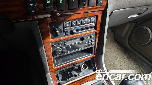 KG Mobility Musso 2002 — photo 28