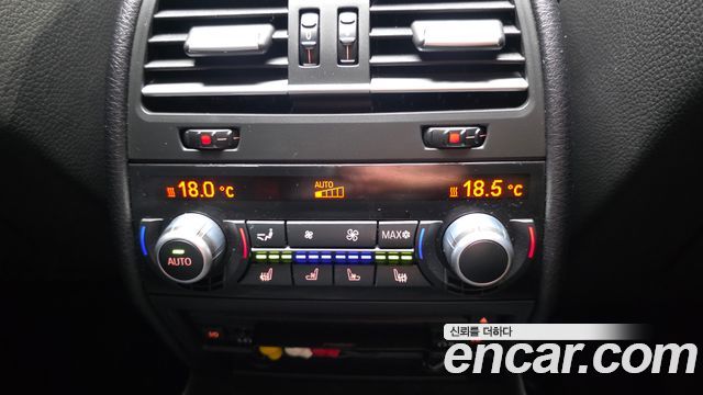 BMW 7-Series 2010 — photo 19