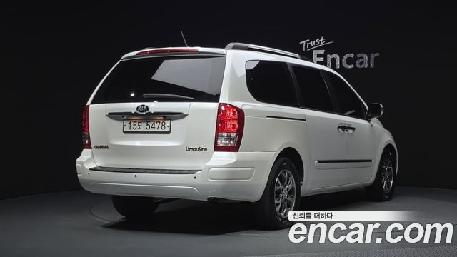 Kia Canival 2014 — photo 2