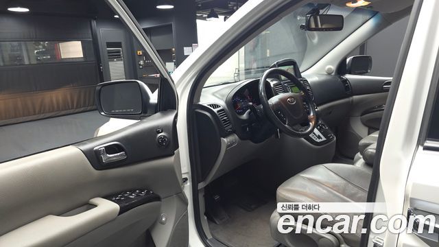 Kia Canival 2014 — photo 13