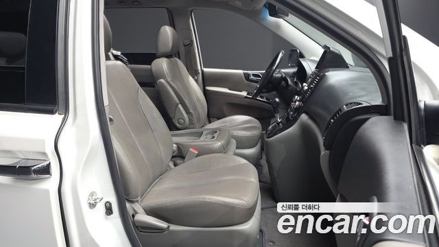 Kia Canival 2014 — photo 16