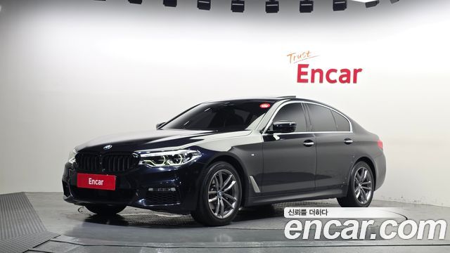 BMW 5-Series 2018 — photo 1