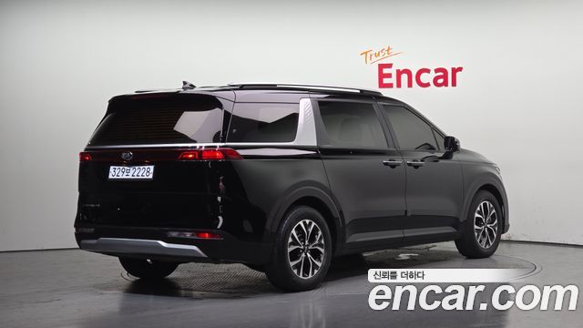 Kia Canival 2021 — photo 2