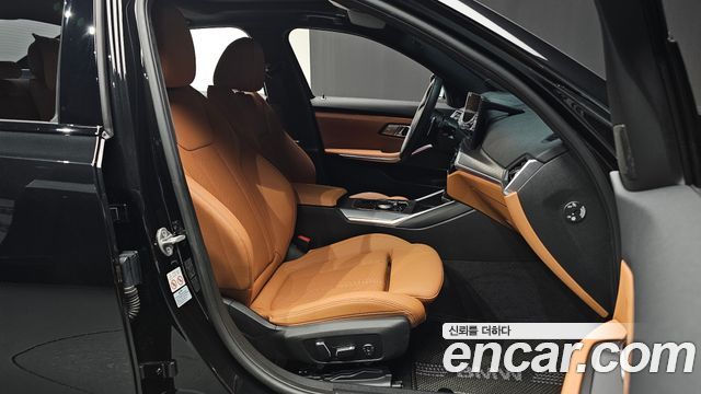BMW 3-Series 2024 — photo 13