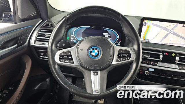 BMW iX3 2023 — photo 19