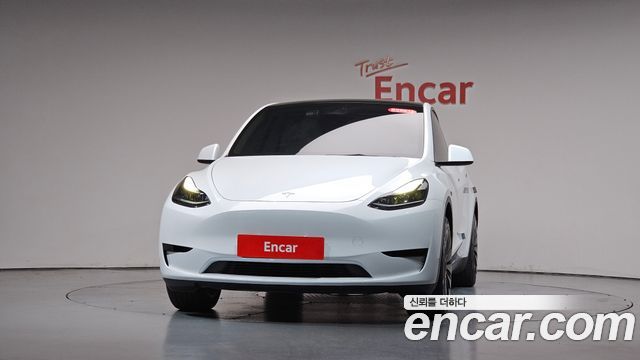 Tesla Model Y 2024 — photo 3