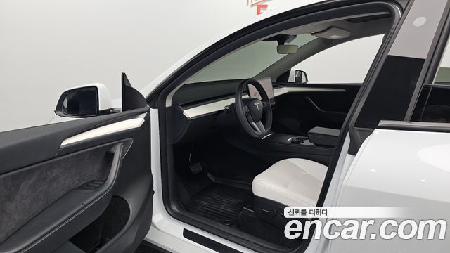 Tesla Model Y 2024 — photo 13