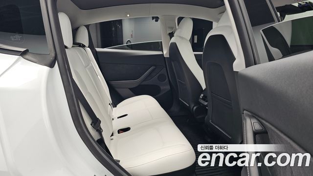 Tesla Model Y 2024 — photo 17