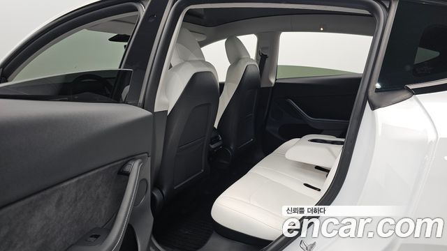 Tesla Model Y 2024 — photo 18