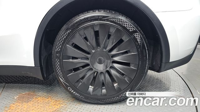 Tesla Model Y 2024 — photo 7