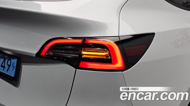Tesla Model Y 2024 — photo 9