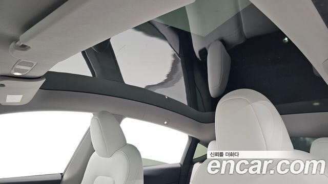 Tesla Model Y 2024 — photo 32