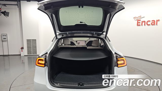 Tesla Model Y 2024 — photo 33
