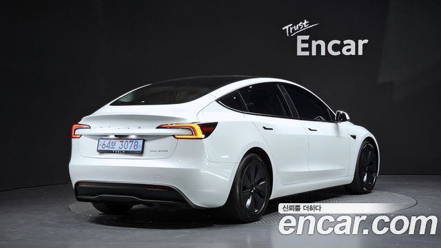 Tesla Model 3 2024 — photo 2