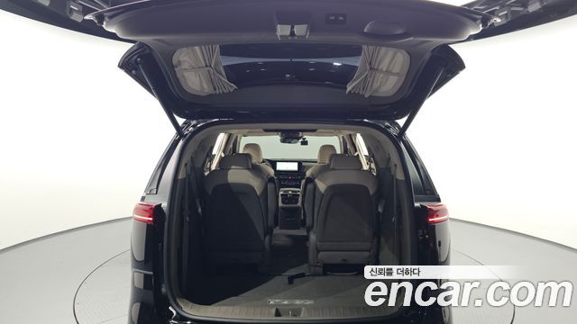 Kia Canival 2023 — photo 34