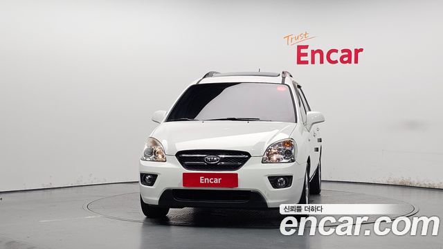 Kia Carens 2009 — photo 3