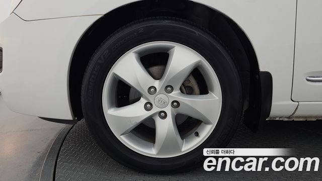 Kia Carens 2009 — photo 5