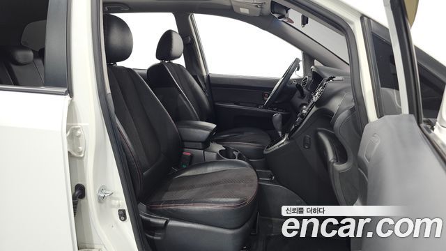Kia Carens 2009 — photo 10