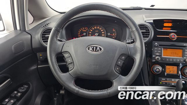 Kia Carens 2009 — photo 13