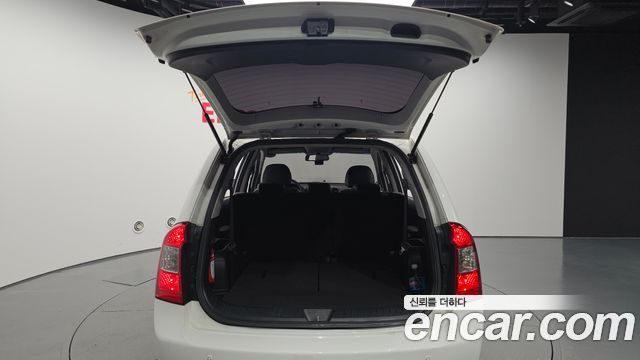 Kia Carens 2009 — photo 20