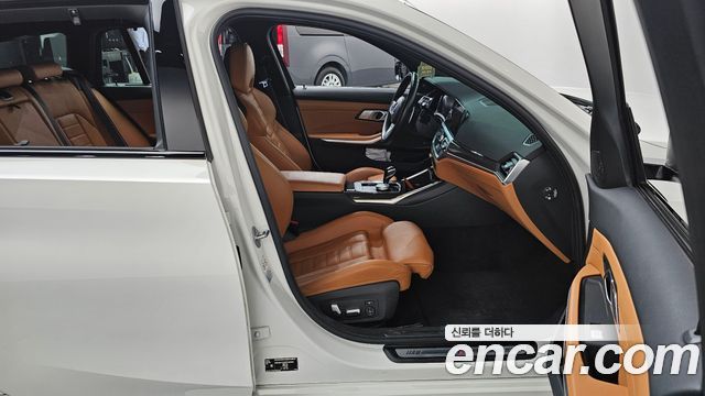 BMW 3-Series 2022 — photo 16