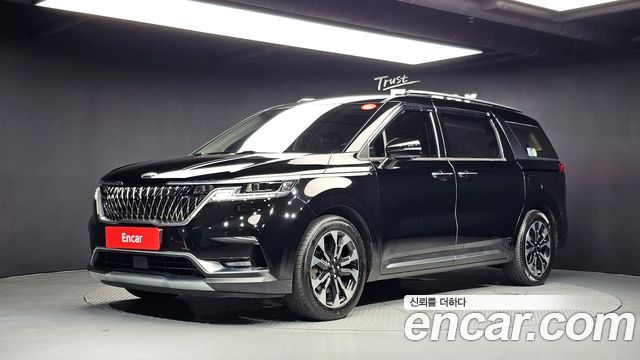Kia Canival 2021 — photo 1