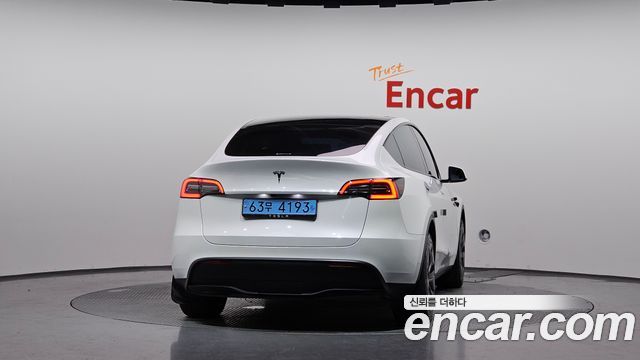 Tesla Model Y 2024 — photo 4