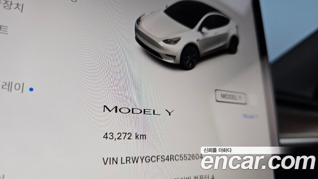 Tesla Model Y 2024 — photo 11