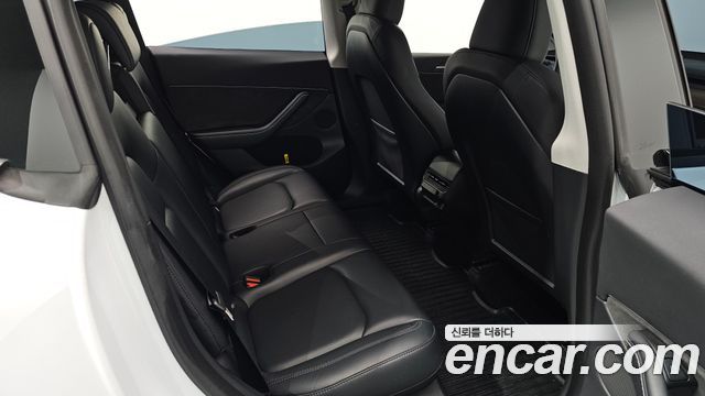 Tesla Model Y 2024 — photo 17