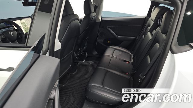 Tesla Model Y 2024 — photo 18