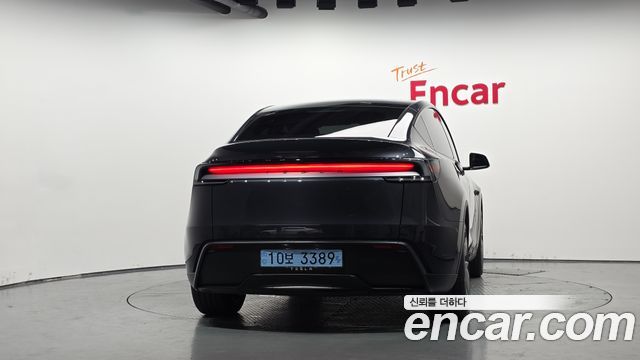 Tesla Model Y 2025 — photo 4
