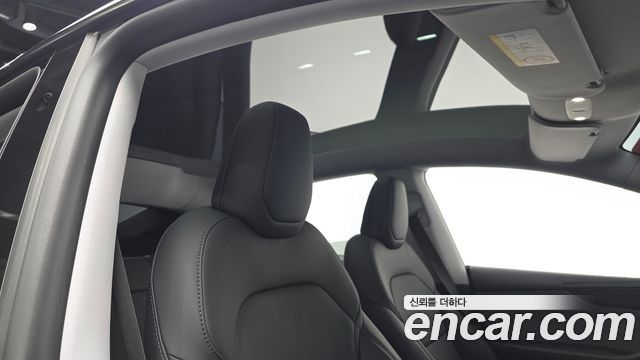 Tesla Model Y 2025 — photo 21