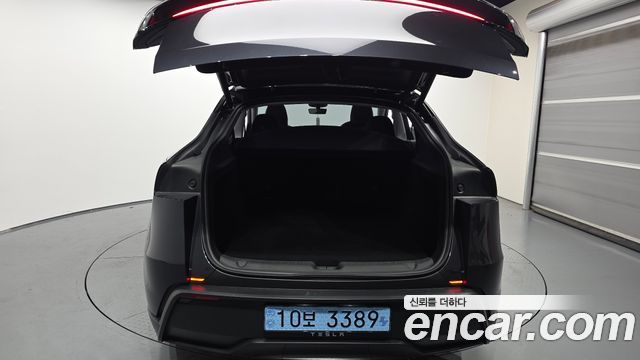 Tesla Model Y 2025 — photo 26
