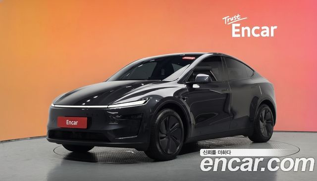 Tesla Model Y 2025 — photo 1