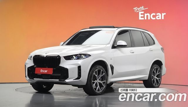 BMW X5 2024 — photo 1