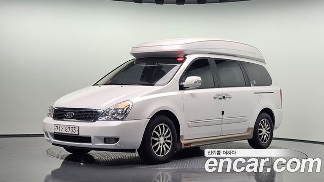 Kia Canival 2012 — photo 1