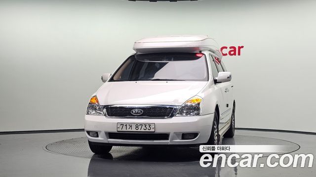 Kia Canival 2012 — photo 3