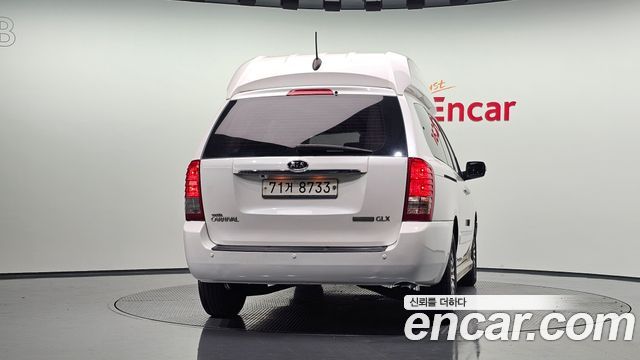 Kia Canival 2012 — photo 4