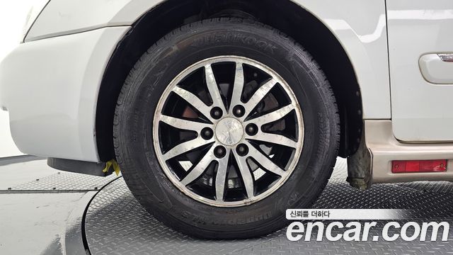 Kia Canival 2012 — photo 5