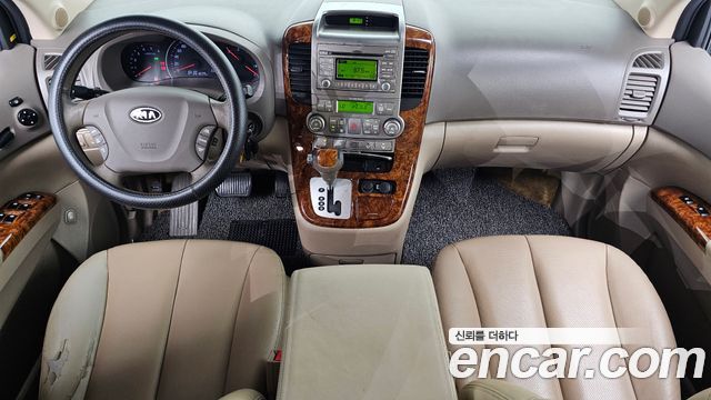 Kia Canival 2012 — photo 10