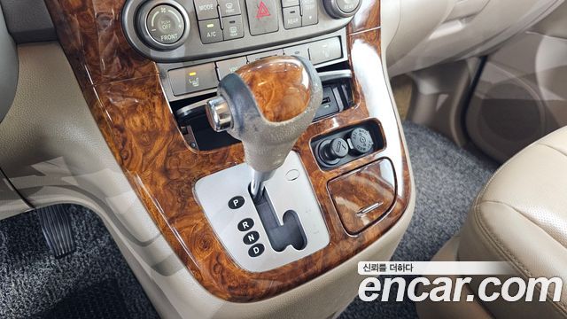 Kia Canival 2012 — photo 12